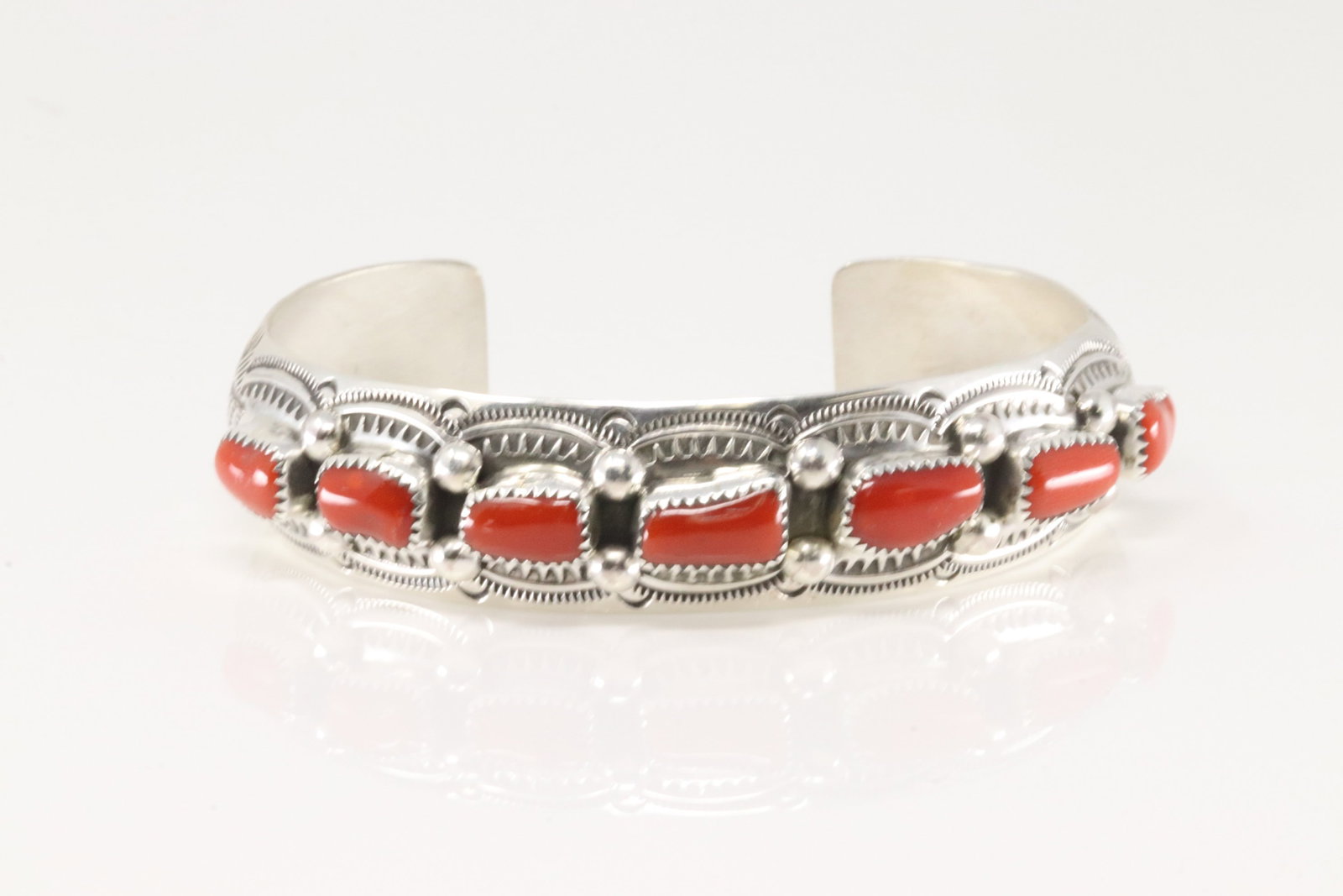 Native America Navajo Sterling Silver Coral Bracelet Cuff By Grace Silver.: This is a Native America Navajo Sterling Silver Coral Bracelet Cuff By Grace Silver.