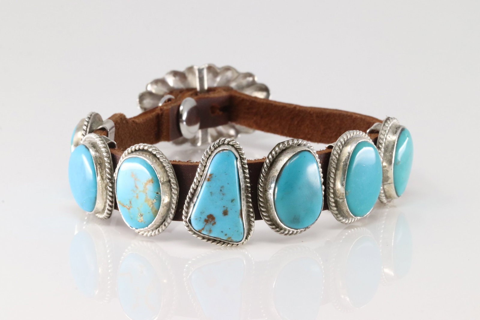 Native America Navajo Sterling Silver Kingman Turquoise Leather Bracelet By R.C.: This is a Native America Navajo Sterling Silver Kingman Turquoise Leather Bracelet By R.C. Bracelet length: 10.00" Adjustable.