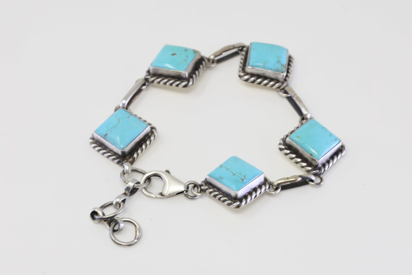 Native America Navajo Sterling Silver Kingman Turquoise Bracelet Link By Augustine Largo.: This is a Native America Navajo Sterling Silver Kingman Turquoise Bracelet Link By Augustine Largo. 9.00" Adjustable"