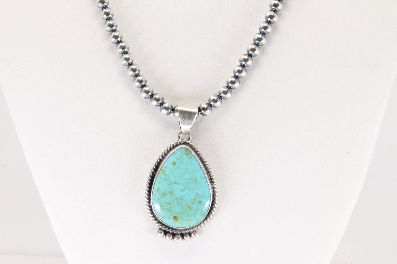 Native America Navajo Sterling Silver Kingman Turquoise Pendant By Judith Dixon. With Pearl Beaded: This is a Native America Navajo Sterling Silver Kingman Turquoise Pendant By Judith Dixon. With Pearl Beaded Sterling Silver Machine Made Necklace. Necklaxce length: 16.00"