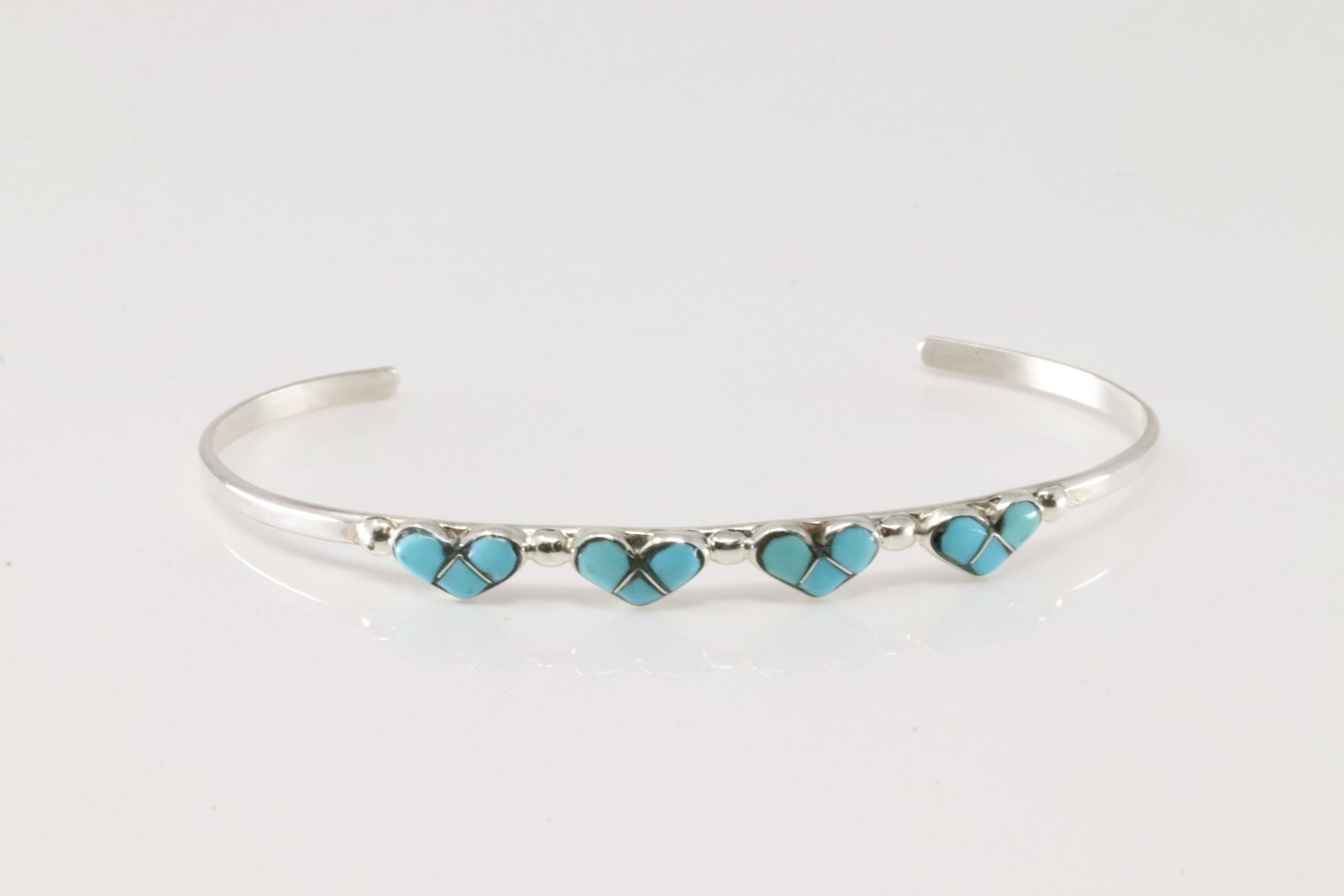Native America Zuni Sterling Silver Turquoise Inlay Heart Bracelet Cuff.: This is a Native America Zuni Sterling Silver Turquoise Inlay Heart Bracelet Cuff.