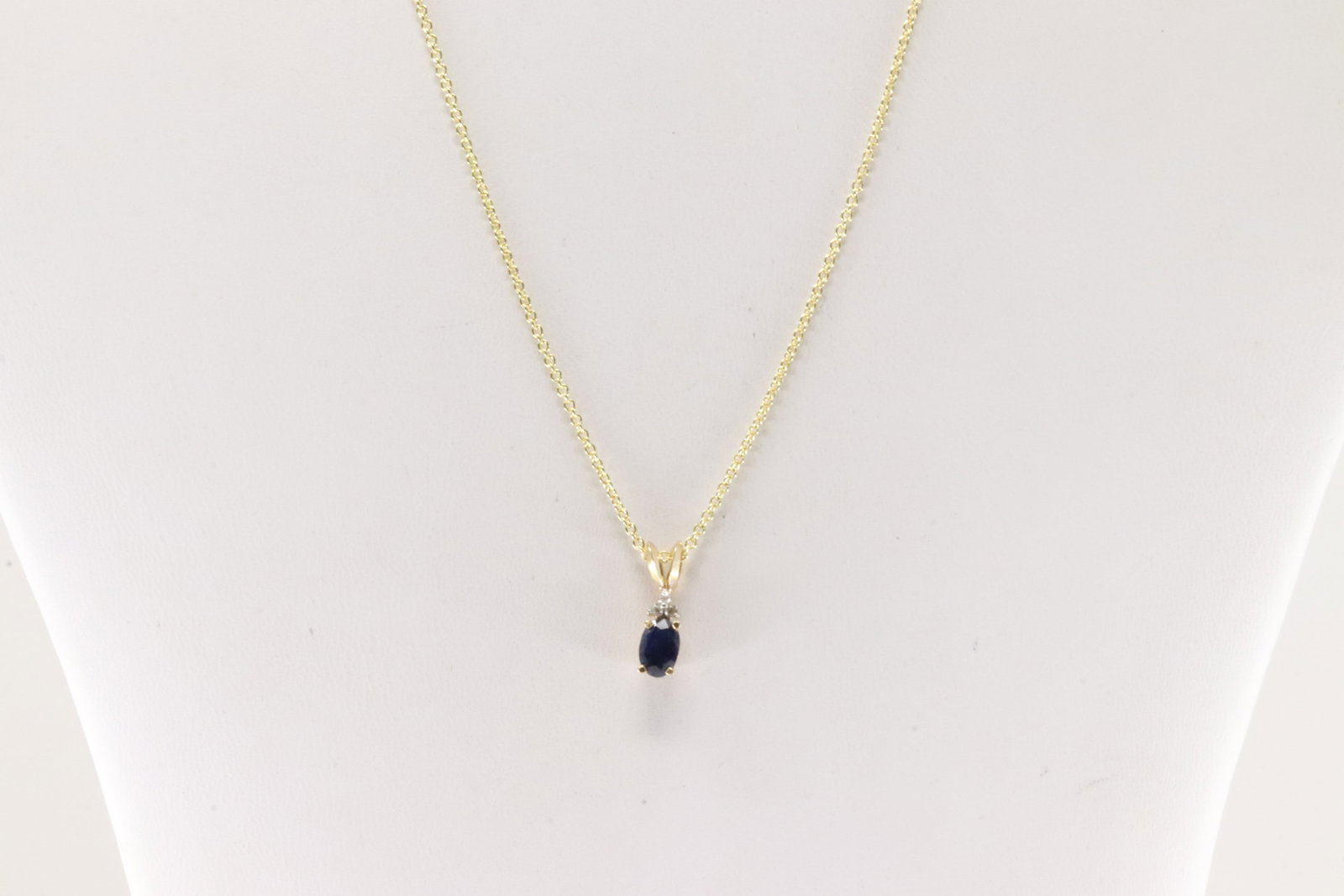 Sapphire & Diamond Pendant / Necklace 14Kt.: 14Kt Yellow Gold Sapphire & Diamond Pendant / Necklace. This pendant has one oval blue sapphire with 3 round diamonds and A 14k necklace. Necklace length: 18.00" Total weight: 2.80 Grams.