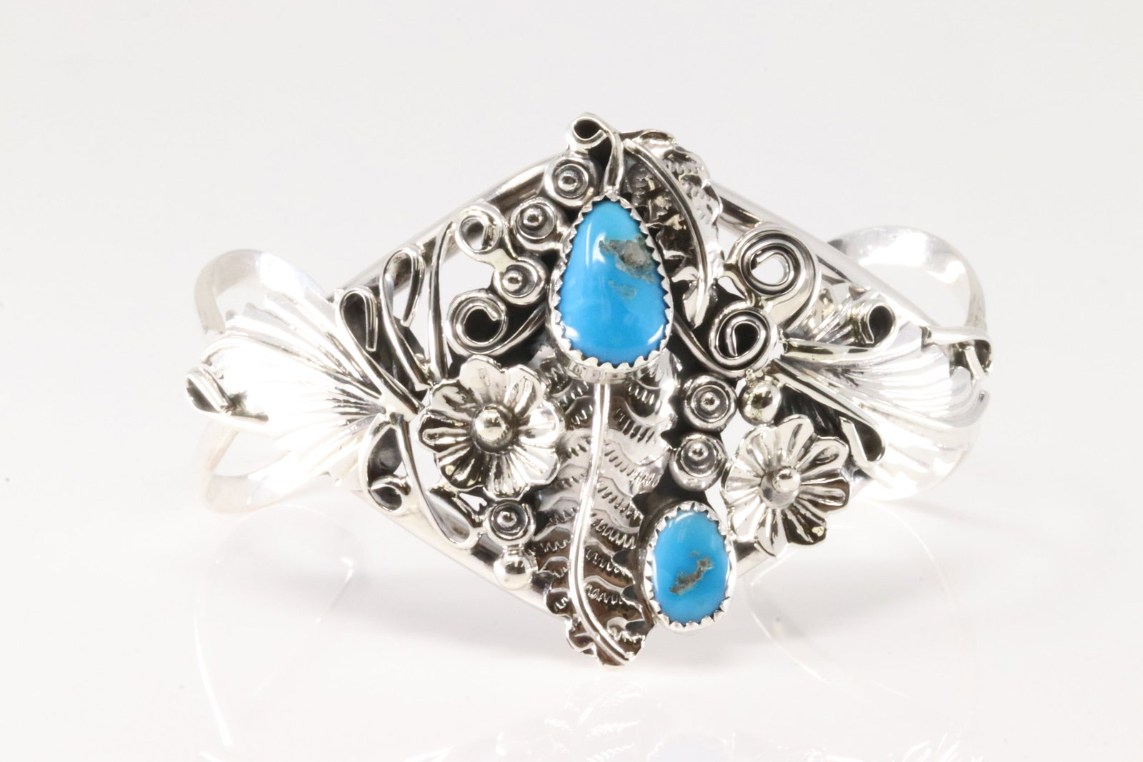 Native America Navajo Sterling Silver Turquoise Floral Bracelet Cuff By Harry B.Yazzie.: This is a Native America Navajo Sterling Silver Turquoise Floral Bracelet Cuff By Harry B.Yazzie.