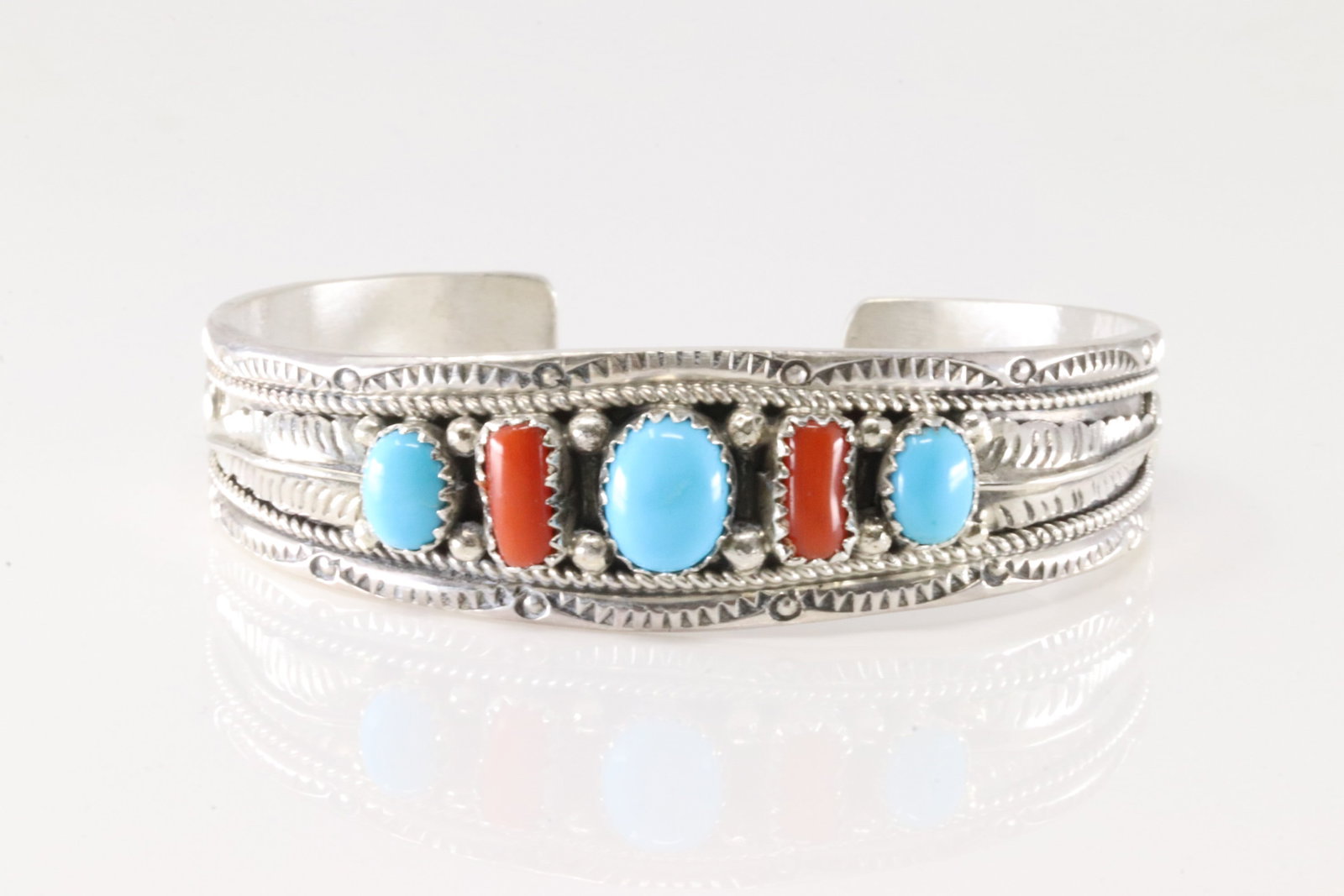 Native America Navajo Sterling Silver Coral & Turquoise Bracelet Cuff By Harrison & Betty Begaye.: This is a Native America Navajo Sterling Silver Coral & Turquoise Bracelet Cuff By Harrison & Betty Begaye.