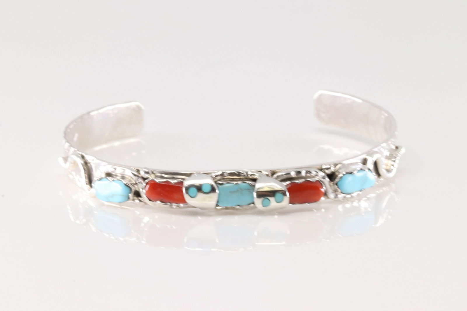 Native America Zuni Sterling Silver Coral & Turquoise Bracelet Cuff By Joy Calavaza.: This is a Native America Zuni Sterling Silver Coral & Turquoise Bracelet Cuff By Joy Calavaza.