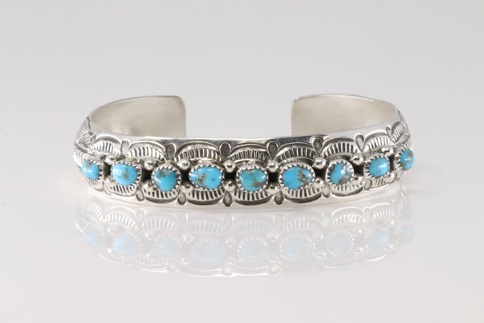 Native America Navajo Sterling Silver Turquoise Bracelet Cuff By Grace Silver.: This is a Native America Navajo Sterling Silver Turquoise Bracelet Cuff By Grace Silver.
