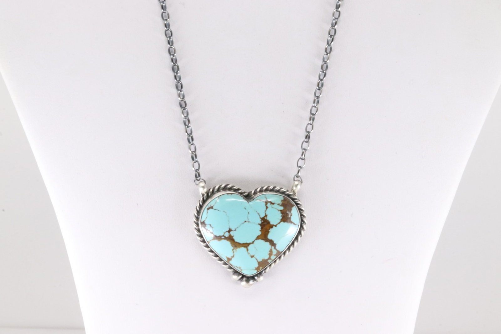 Native America Navajo Sterling Silver Kingman Turquoise Heart Necklace By Johnny Dixon.: This is a Native America Navajo Sterling Silver Kingman Turquoise Heart Necklace By Johnny Dixon. Necklace length: 18.00"
