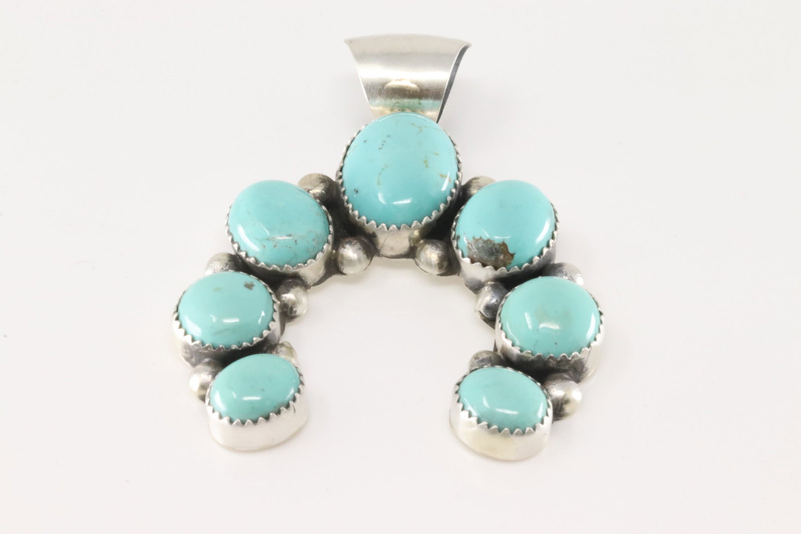 Native America Navajo Sterling Silver Kingman Turquoise Naja Pendant By Augustine Largo.: This is a Native America Navajo Sterling Silver Kingman Turquoise Naja Pendant By Augustine Largo.