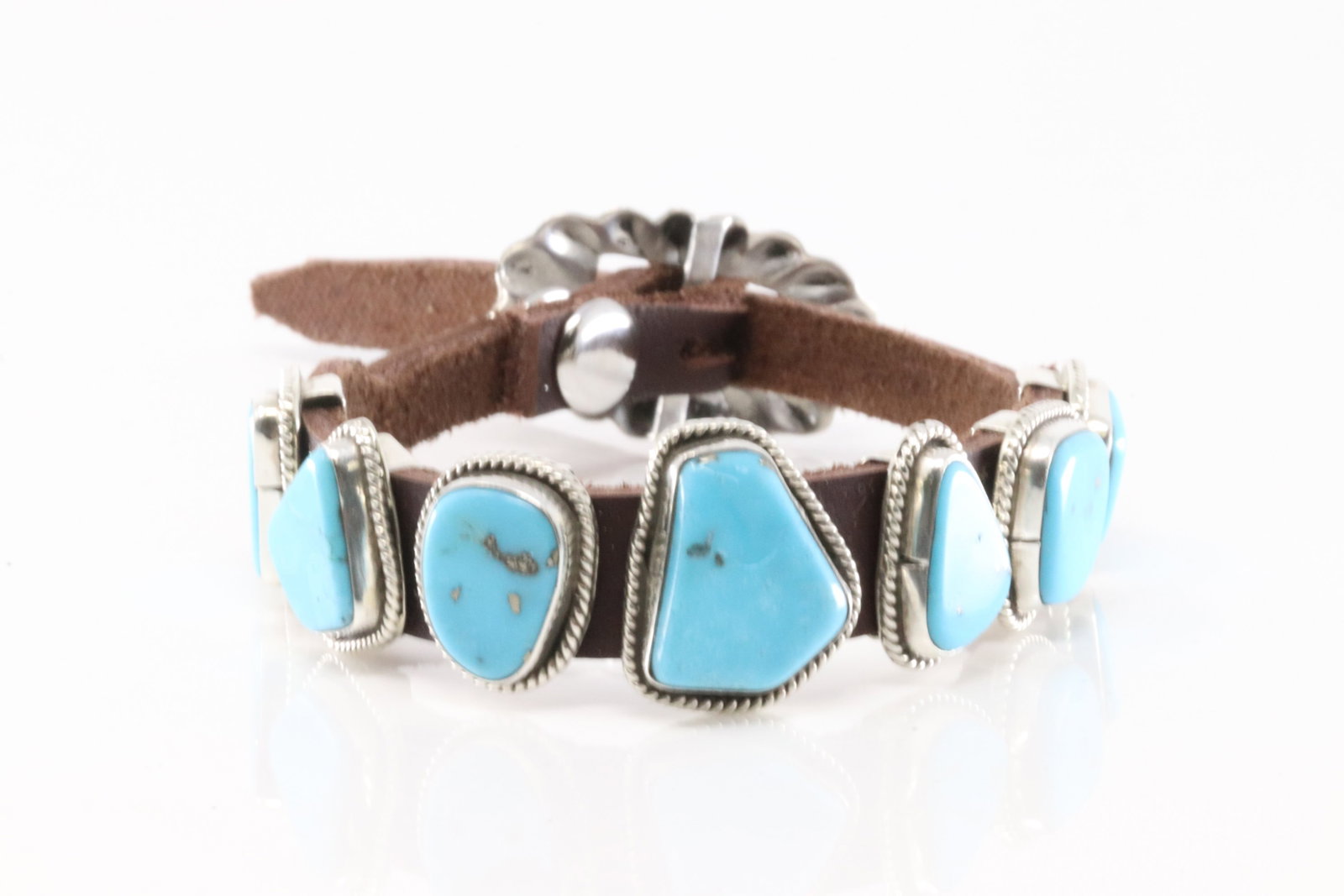 Native America Navajo Sterling Silver Turquoise Leather Bracelet By M.: This is a Native America Navajo Sterling Silver Turquoise Leather Bracelet By M. Bracelet length: 10.00" Adjustable.