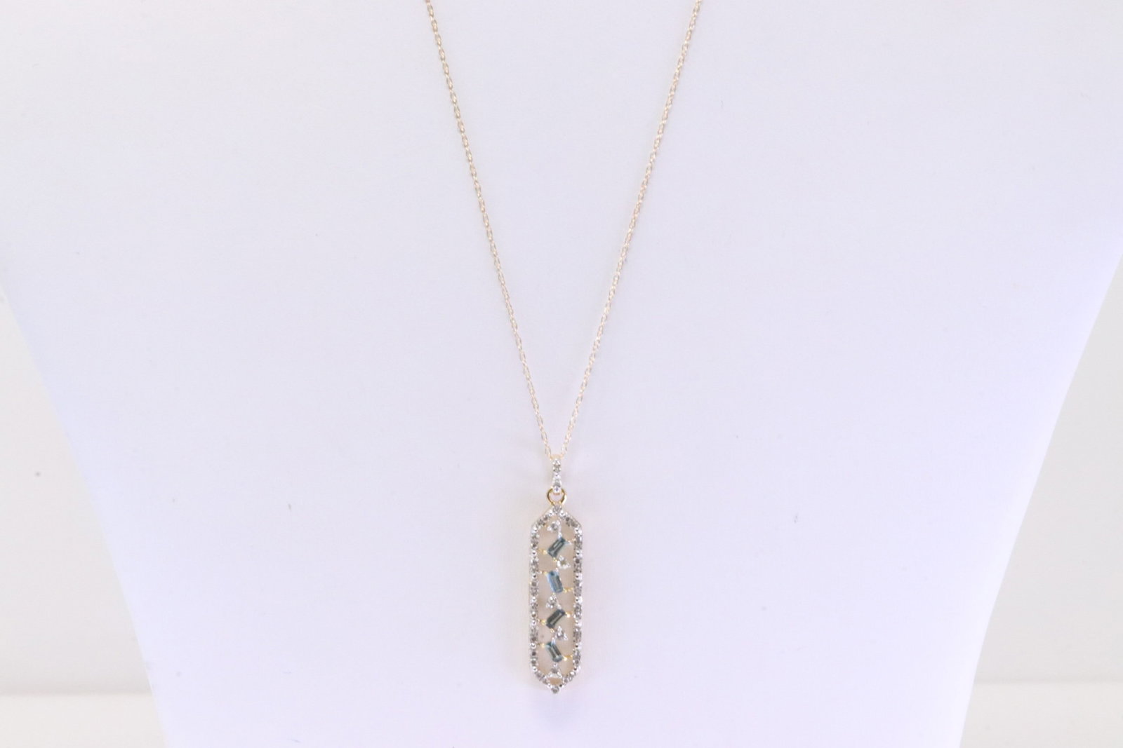 London Blue Topaz & Diamond Pendant / Necklace 10Kt.: 10Kt Yellow Gold London Blue Topaz & Diamond Pendant / Necklace. Necklace has Pendant with Cut-London Blue Topaz Gems & round Diamonds. Diamonds weight: 0.25ctw. Necklace length: 18.00" Total weight: 