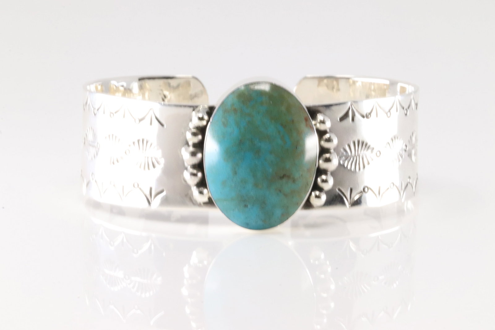 Native America Navajo Sterling Silver Turquoise Bracelet Cuff By Daniel Dakai.: This is a Native America Navajo Sterling Silver Turquoise Bracelet Cuff By Daniel Dakai.
