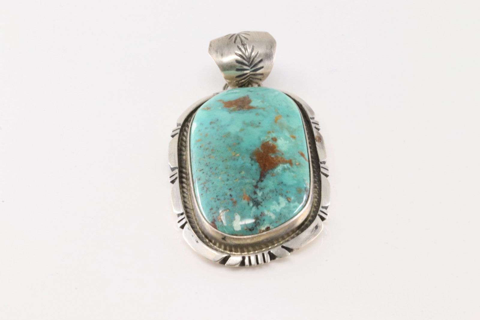 Native America Navajo Sterling Silver Kingman Turquoise Pendant By Alfred Martinez.: This is a Native America Navajo Sterling Silver Kingman Turquoise Pendant By Alfred Martinez.