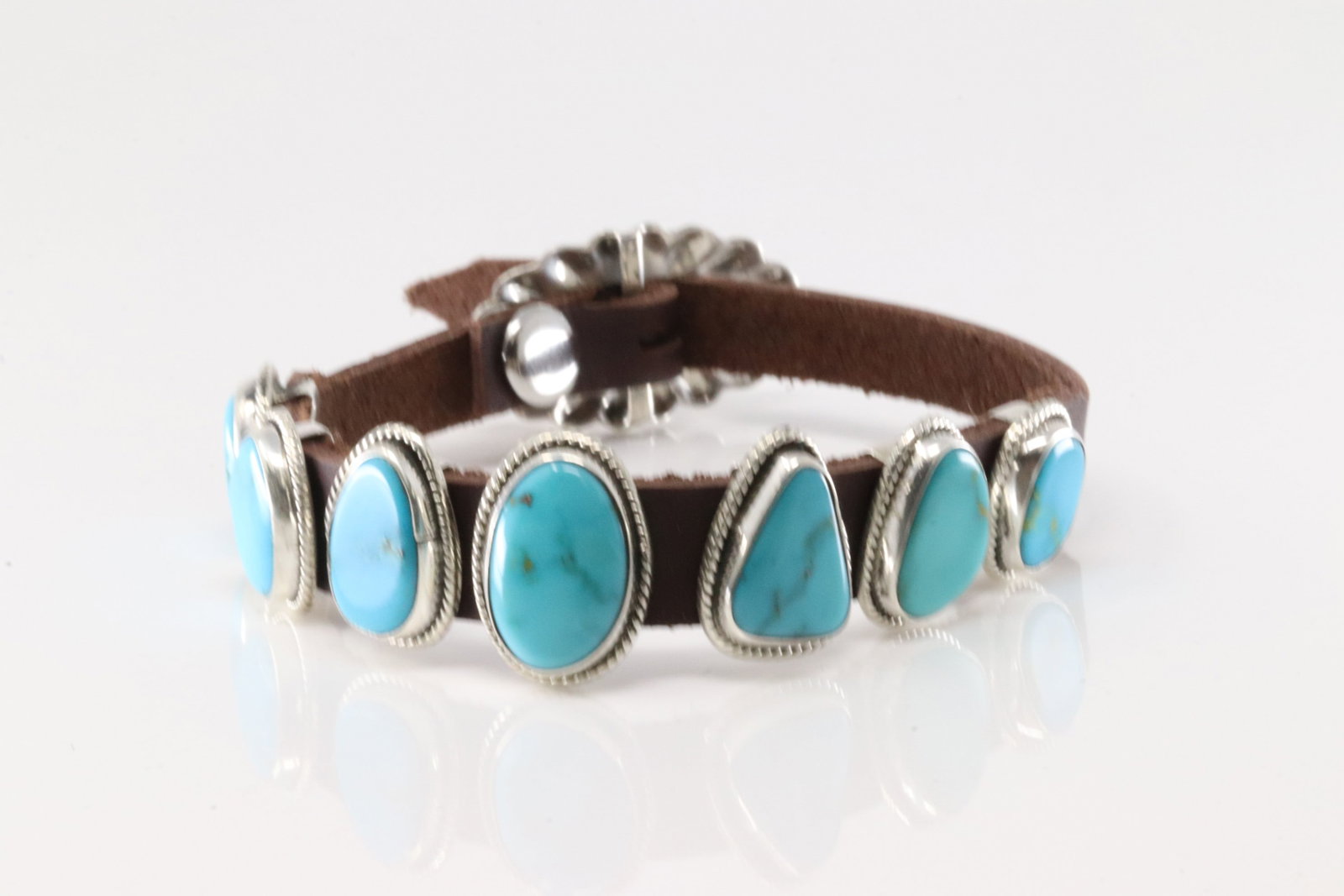 Native America Navajo Sterling Silver Turquoise Bracelet Leather By M.: This is a Native America Navajo Sterling Silver Turquoise Bracelet Leather By M. Bracelet length: 10.00"
