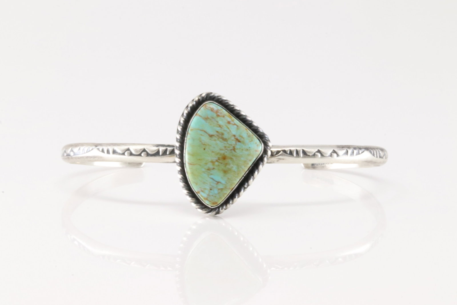 Native America Navajo Sterling Silver Turquoise Bracelet Cuff By D.: This is a Native America Navajo Sterling Silver Turquoise Bracelet Cuff By D.
