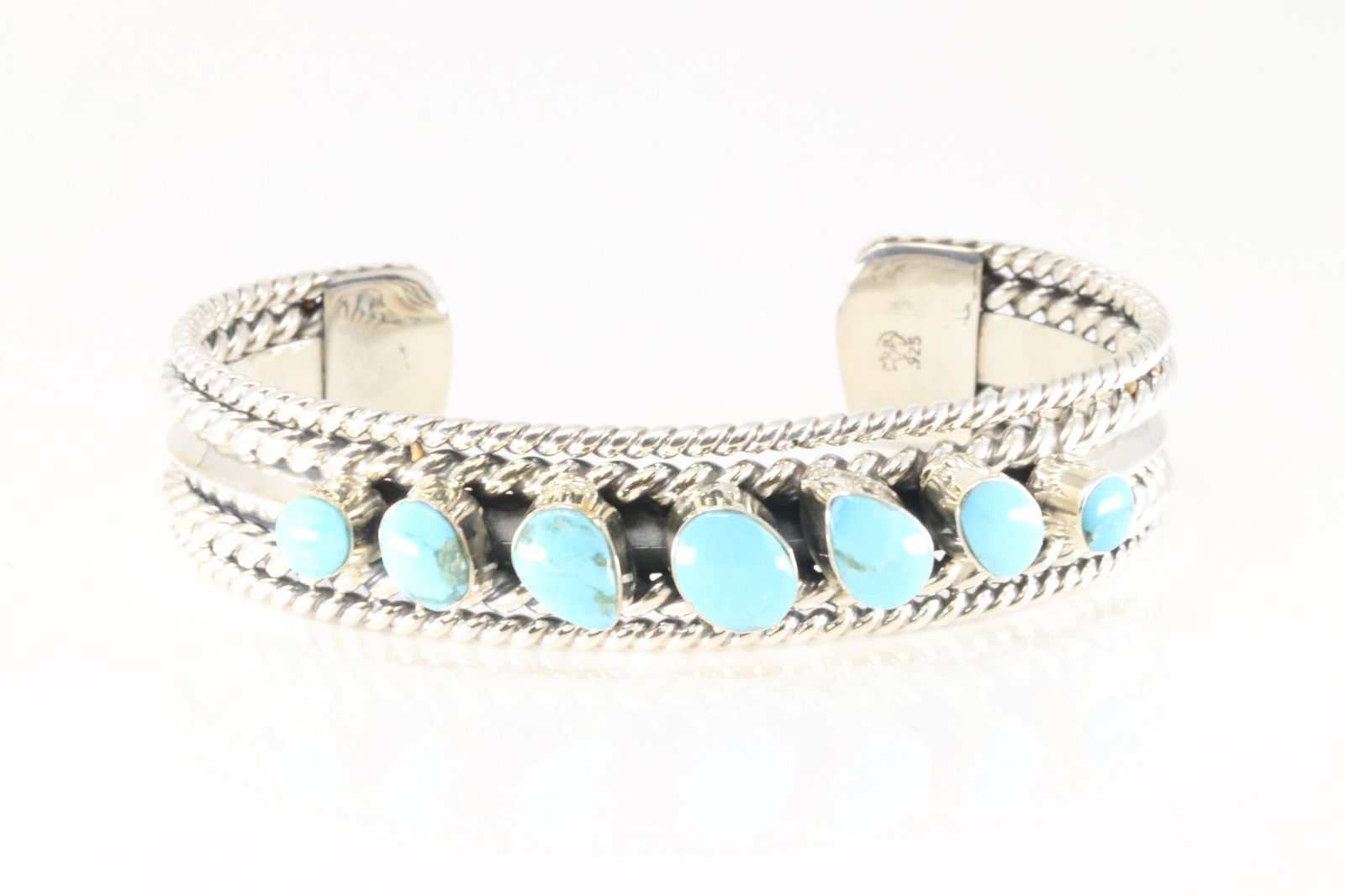 Native America Navajo Sterling Silver Turquoise Bracelet By Mike Smith.: This is a Native America Navajo Sterling Silver Turquoise Bracelet By Mike Smith.