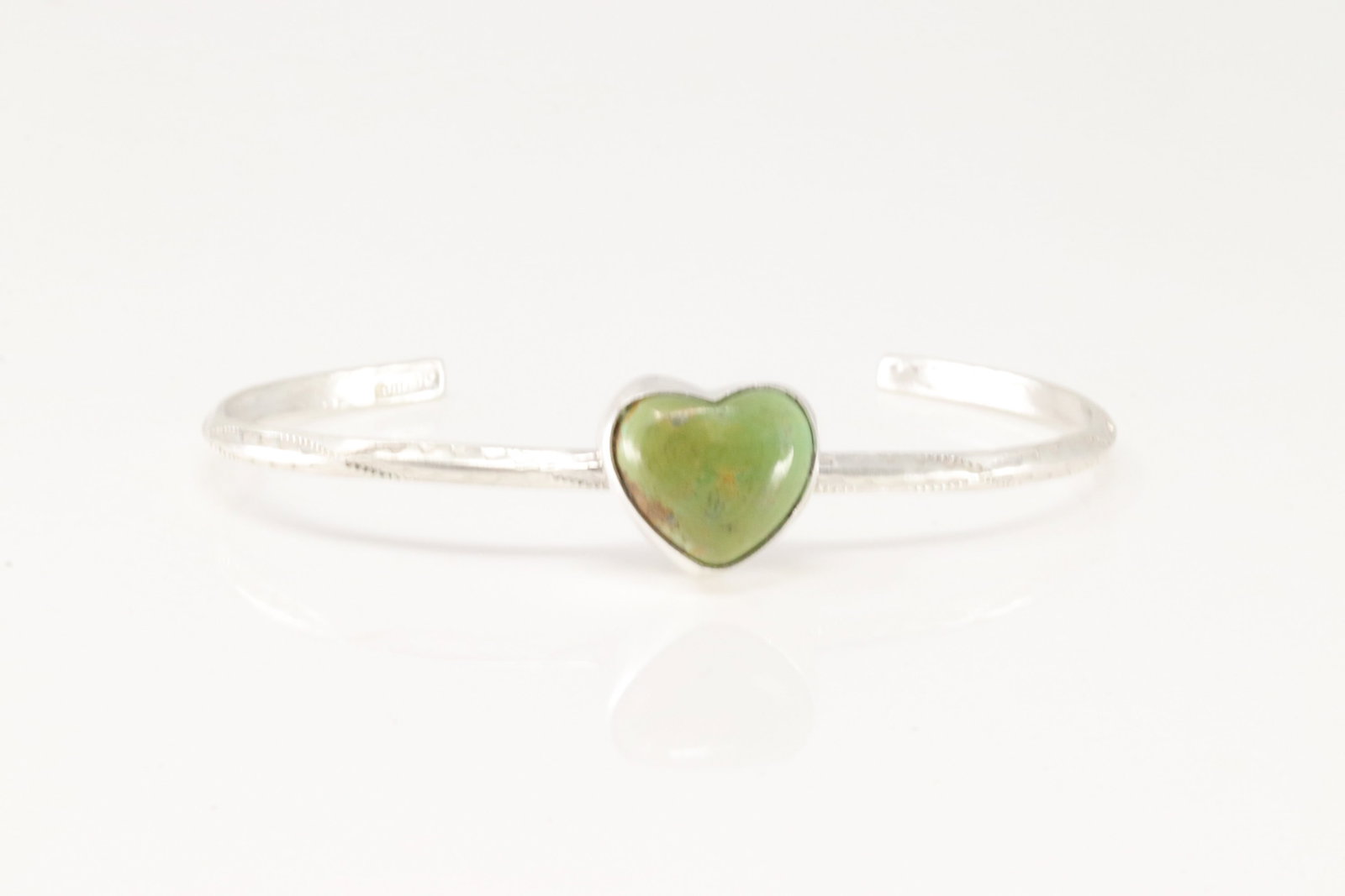 Native American Navajo Sterling Silver Turquoise Heart Bracelet Cuff By D.: This is a Native American Navajo Sterling Silver Turquoise Heart Bracelet Cuff By D.