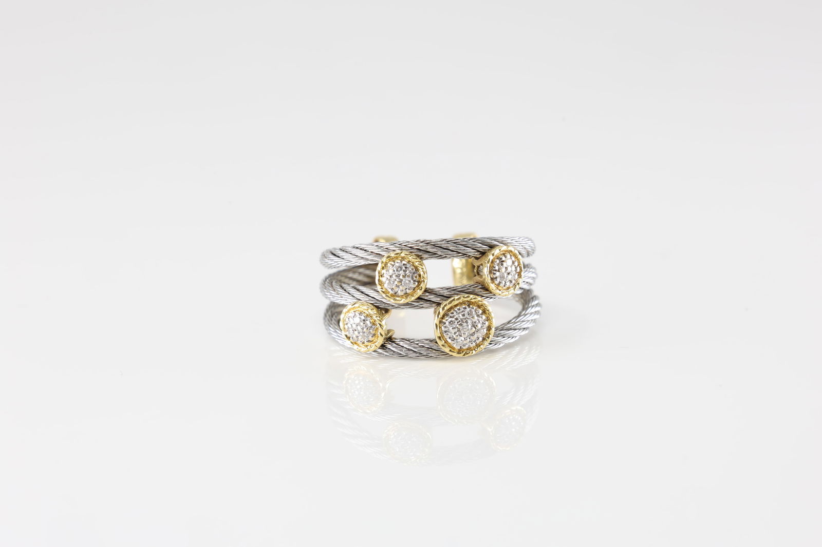 Charriol Diamond Cable Ring 18Kt.: Charriol 18Kt Yellow Gold Diamond / Cable Steel Ring. Ring has a unique cable design, elegantly intertwined to create a sophisticated look. Adorned with shimmering gold & diamonds accents. Ring size: