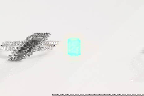 Elegant Emerald & Diamond Ring 18Kt.: Ladies 18Kt White Gold Elegant Emerald & Diamond Ring. This charming ring has green emerald surrender by 42 brilliants diamonds. Diamonds weight approx: 1.00ctw. Ring size: 8.75. Total weight: 4.30 Gr
