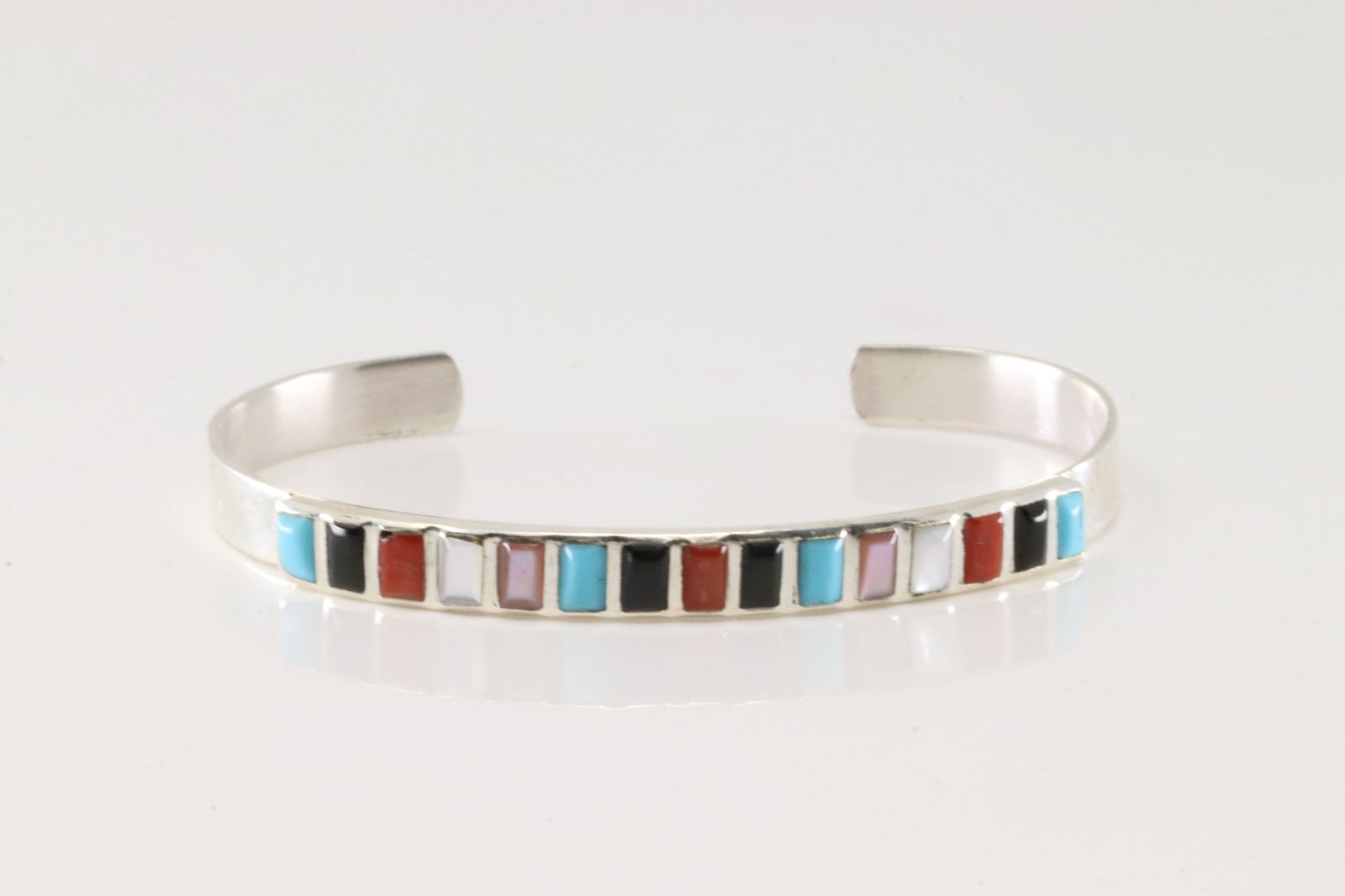 Native America Navajo Sterling Silver Multi-Color Stone Bracelet Cuff.: This is a Native America Navajo Sterling Silver Storyteller Bracelet Cuff.