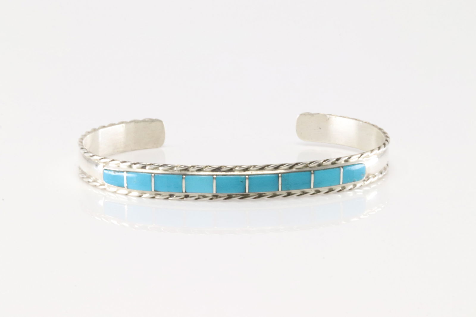 Native America Zuni Sterling Silver Turquoise Inlay Bracelet Cuff By J.P.C.: This is a Native America Zuni Sterling Silver Turquoise Inlay Bracelet Cuff By J.P.C.