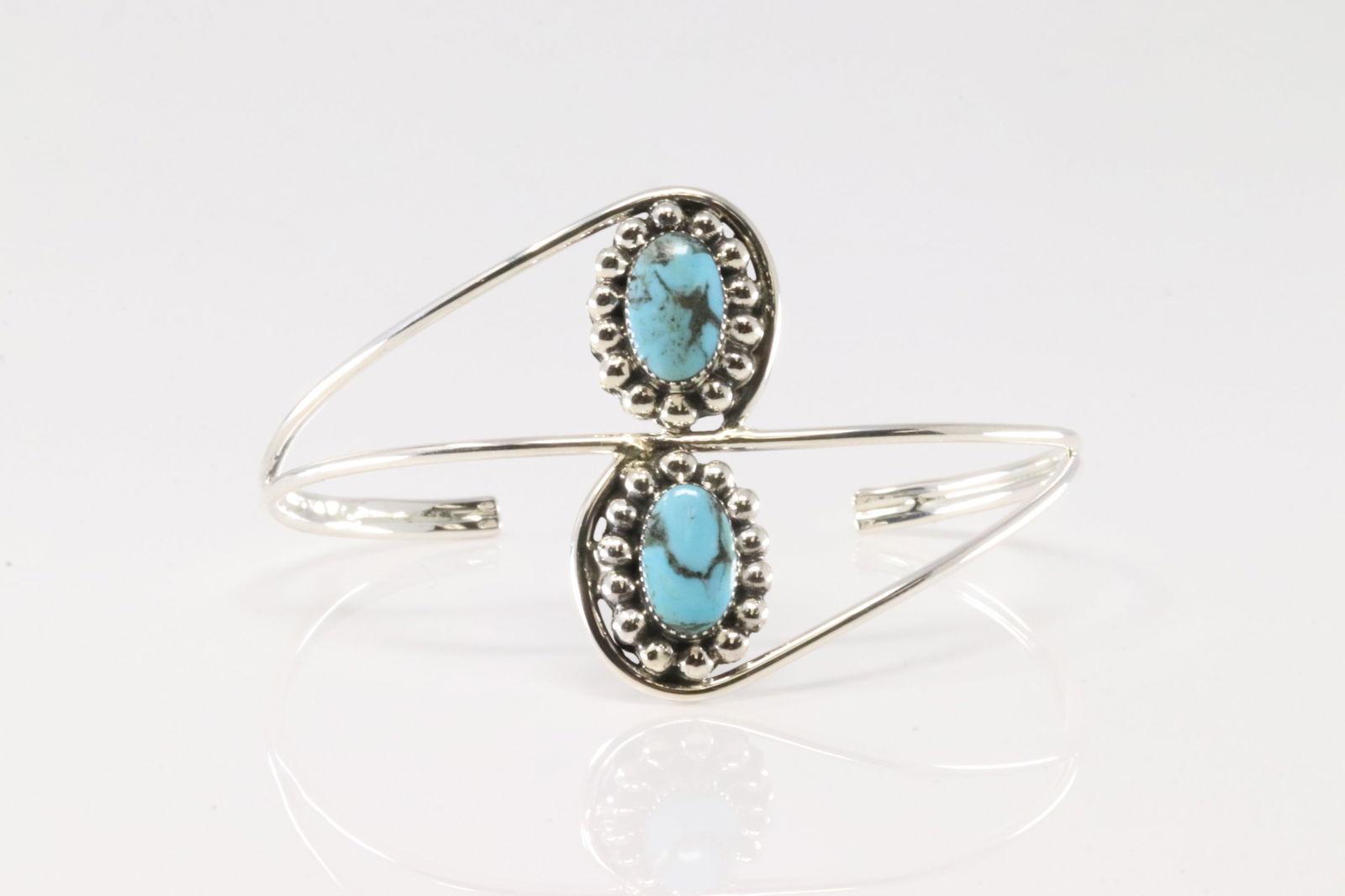 Native America Navajo Sterling Silver Turquoise Bracelet Cuff By Sadie Jim.: This is a Native America Navajo Sterling Silver Turquoise Bracelet Cuff By Sadie Jim.