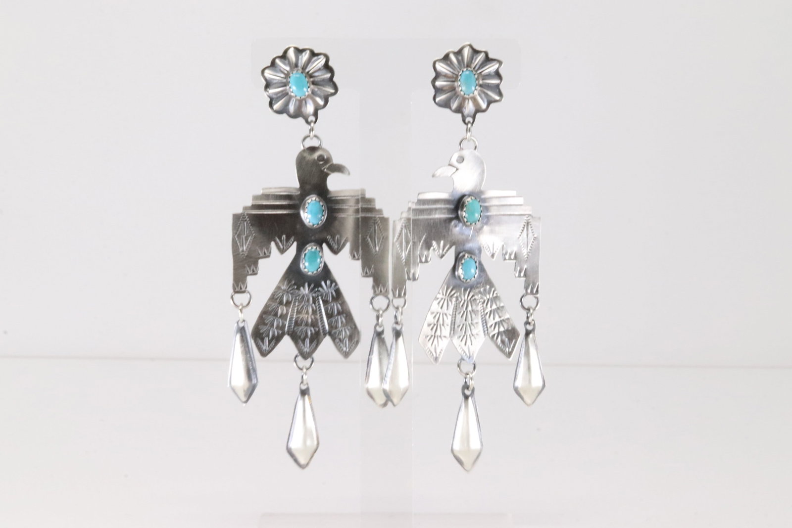 Native American Navajo Sterling Silver Kingman Turquoise Thunderbird Post / Dangling Earring's By: This is a Native American Navajo Sterling Silver Kingman Turquoise Thunderbird Post / Dangling Earring's By Cordallo Chee.