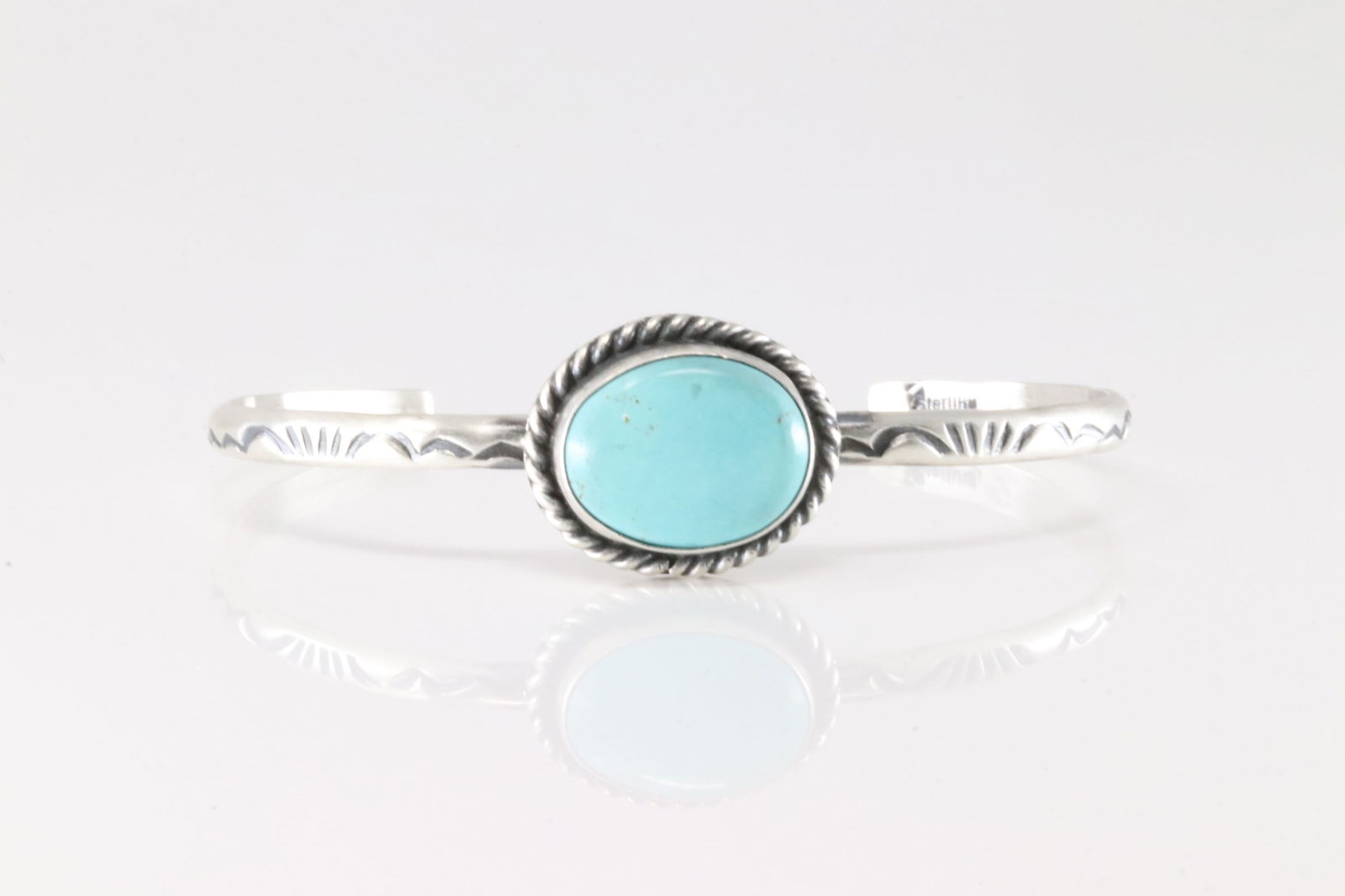 Native America Navajo Sterling Silver Turquoise Bracelet Cuff By D.: This is a Native America Navajo Sterling Silver Turquoise Bracelet Cuff By D.