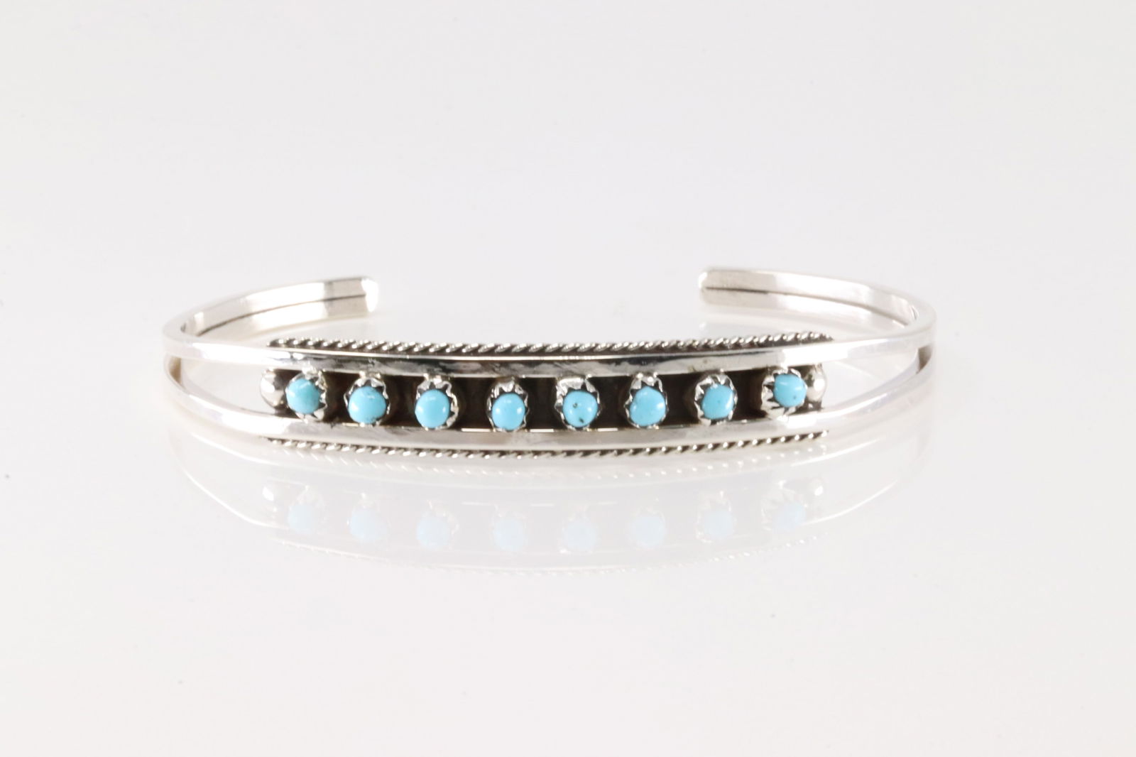 Native America Zuni Sterling Silver Turquoise Bracelet Cuff By Susie Livingston.: This is a Native America Zuni Sterling Silver Turquoise Bracelet Cuff By Susie Livingston.
