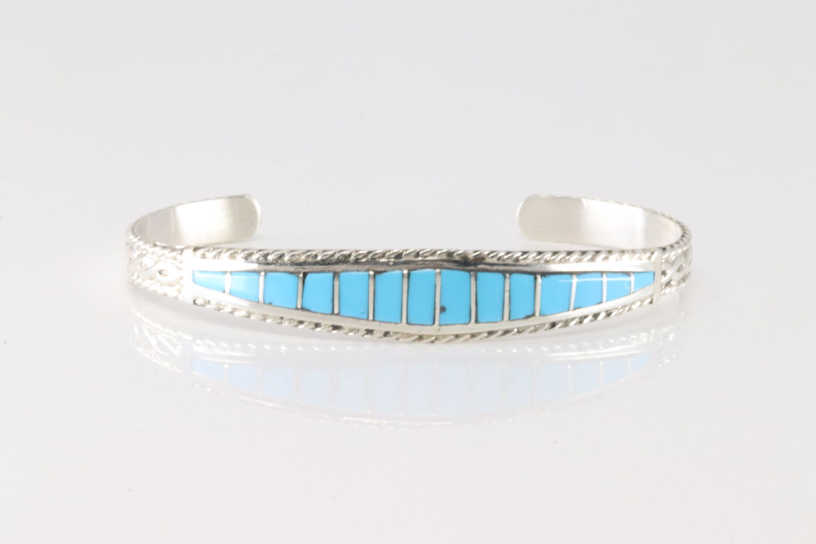 Native America Zuni Sterling Silver Turquoise Inlay Bracelet Cuff By Mirenda Penetsa.: This is a Native America Zuni Sterling Silver Turquoise Inlay Bracelet Cuff By Mirenda Penetsa.
