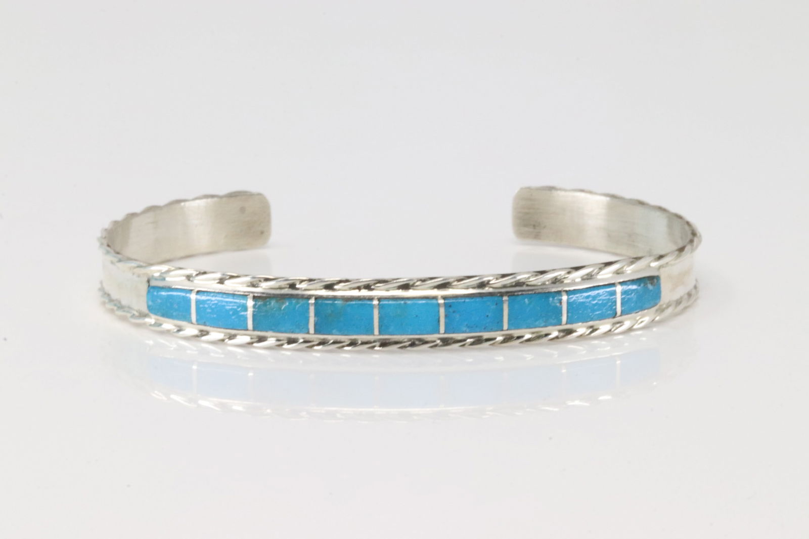 Native America Zuni Sterling Silver Turquoise Inlay Bracelet Cuff By J.P.C.: This is a Native America Zuni Sterling Silver Turquoise Inlay Bracelet Cuff By J.P.C.