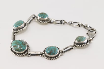 Native America Navajo Sterling Silver Kingman Turquoise Bracelet Link By Augustine Largo.