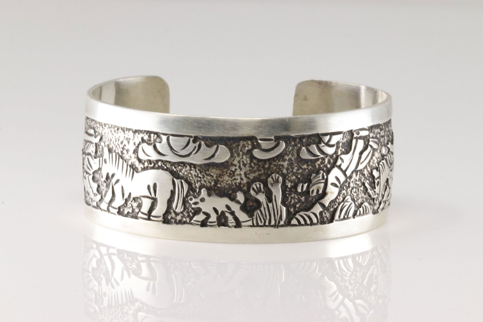 Native America Navajo Sterling Silver Solid Storyteller Bracelet Cuff By B.: This is a Native America Navajo Sterling Silver Solid Storyteller Bracelet Cuff By B.