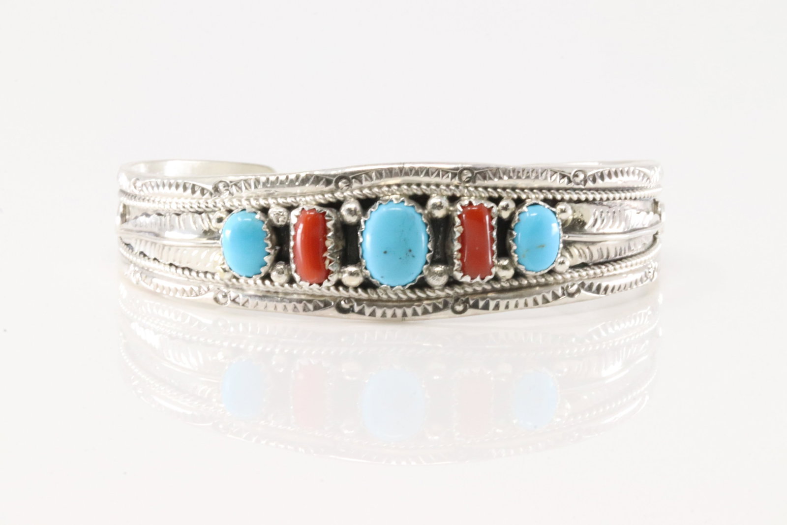 Native America Navajo Sterling Silver Coral & Turquoise Bracelet Cuff By Harrison & Betty Begaye.: This is a Native America Navajo Sterling Silver Coral & Turquoise Bracelet Cuff By Harrison & Betty Begaye.