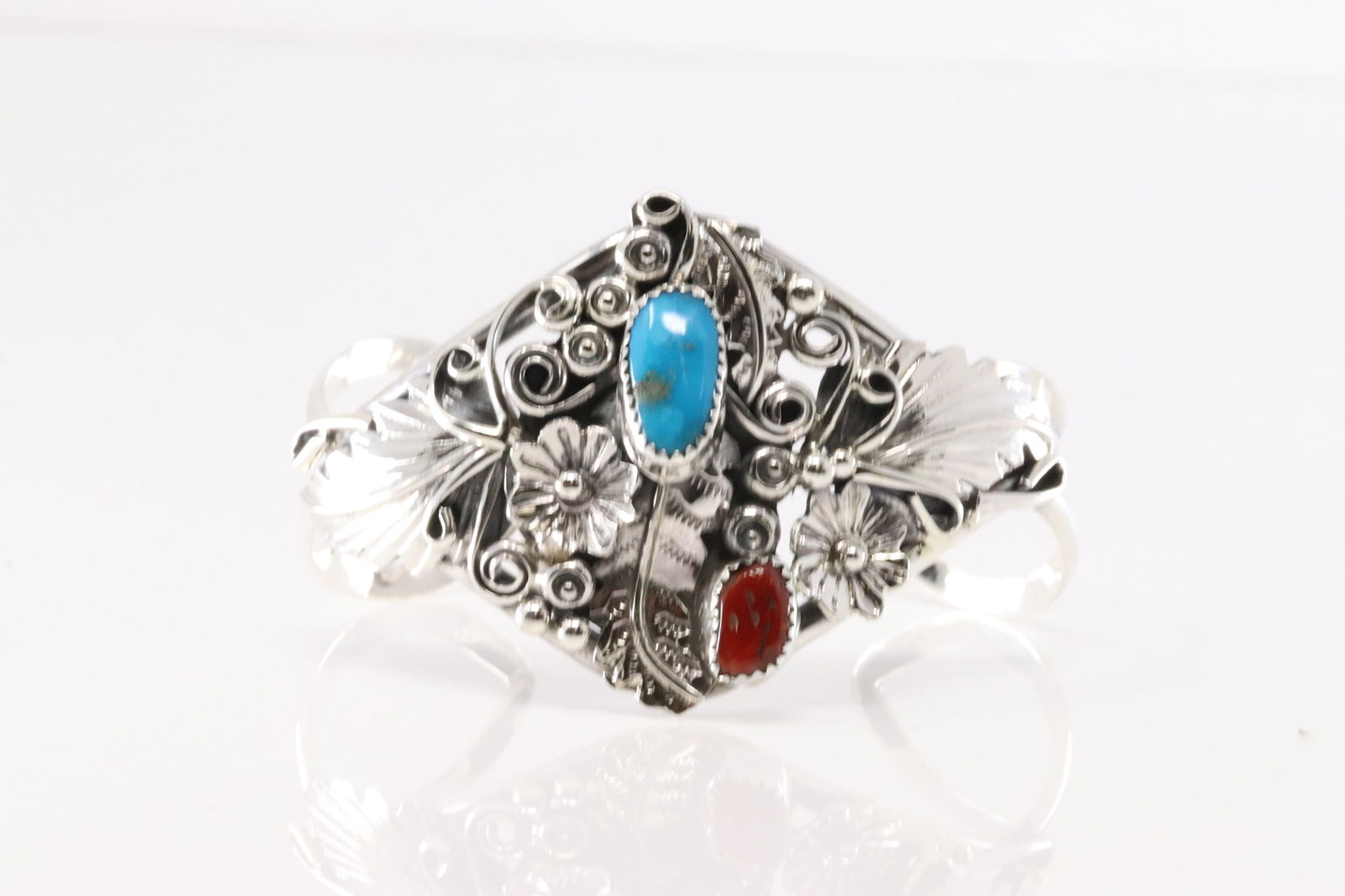 Native America Navajo Sterling Silver Coral & Turquoise Floral Bracelet Cuff By Harry B.Yazzie.: This is a Native America Navajo Sterling Silver Coral & Turquoise Floral Bracelet Cuff By Harry B.Yazzie.