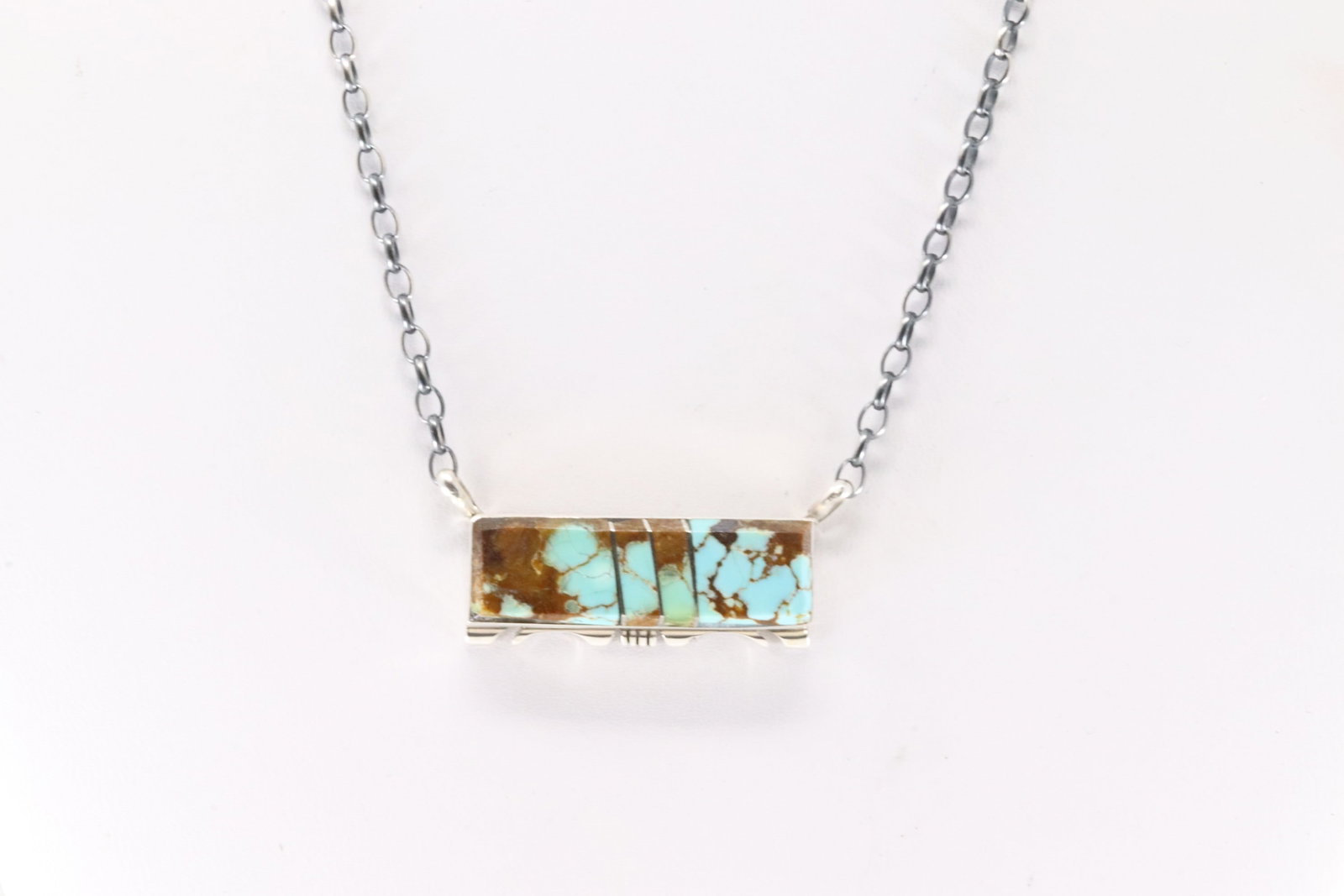 Native America Navajo Sterling Silver Number 8 Turquoise Inlay Necklace By Steve Francisco. Necklace: This is a Native America Navajo Sterling Silver Number 8 Turquoise Inlay Necklace By Steve Francisco. Necklace length: 16.00"