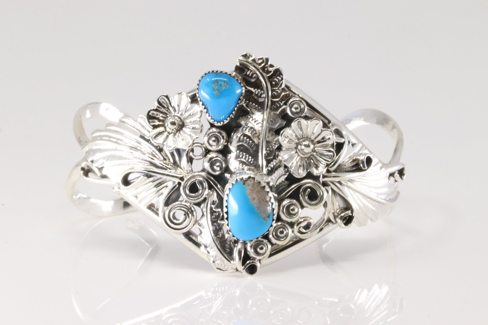 Native America Navajo Sterling Silver Turquoise Floral Bracelet Cuff By Harry B.Yazzie.: This is a Native America Navajo Sterling Silver Turquoise Floral Bracelet Cuff By Harry B.Yazzie.