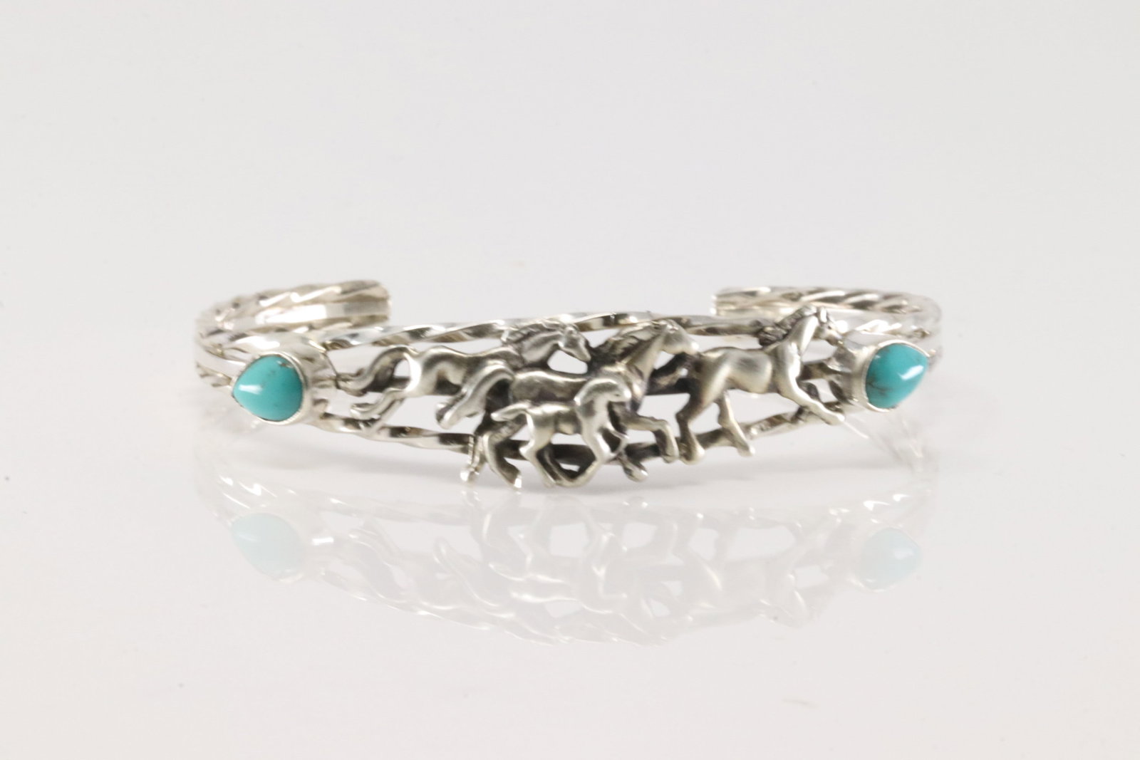 Native America Navajo Sterling Silver Turquoise Horse Bracelet Cuff By Bobby Platero.: This is a Native America Navajo Sterling Silver Turquoise Horse Bracelet Cuff By Bobby Platero.
