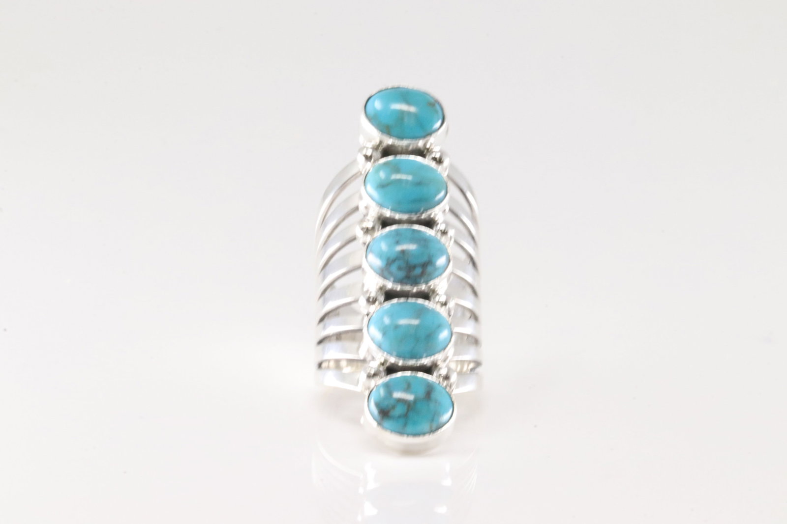 Native America Navajo Sterling Silver Turquoise Ring 5 Stone By Thomas Yazzie.: This is a Native America Navajo Sterling Silver Turquoise Ring 5 Stone By Thomas Yazzie. Ring size: 7.75.