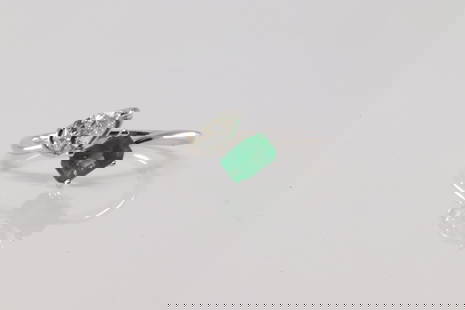 Emerald & Diamond Ring 14Kt.: Ladies 14Kt White Gold Emerald & Diamond Ring. This Elegant Ring has Green Emerald with Pear-Shape Diamond. Diamonds weight: 0.36ct. Emerald weight: 0.40ct. Ring size: 6.50. Total weight: 2.10 Grams.