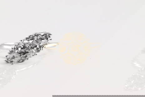 Diamond Ring 10Kt.: Ladies 10Kt White Gold Diamond Ring. This ring has flower design with 7 accents diamonds. Ring size: 6.50. Total weight: 2.50 Grams.