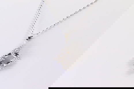 Diamond Pendant 18Kt.: Ladies 18Kt White Gold Diamond Pendant. Pendant has 16 round Diamonds with A 14k Necklace. Diamonds weight: approx 0.50ctw.Necklace length: 22.00" Total weight: 4.90 Grams.