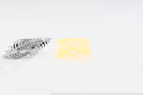 Signed Diamond Ring 18Kt.: Signed 18Kt Yellow Gold Diamond Ring. Ring has a modern style with 10 round sparkling diamonds & a row of steel steen. Diamonds weight approx: 0.35ctw. Ring size: 5.25. Total weight: 9.90 Grams.