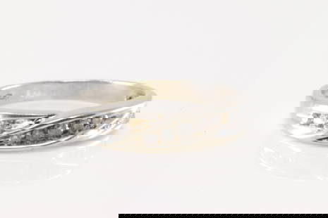 Wedding Diamond Ring 14Kt.: 14Kt White Gold Wedding Diamodn Ring. This wedding ring has 10 sparkling diamonds. Ring sizre: 7.75. Total weight: 3.10 Grams.