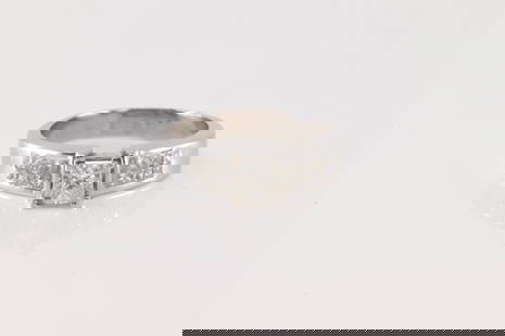 Engagement Diamond Ring 18Kt.: Ladies 18Kt White Gold Engagement Diamond Ring. This elegant engagement ring has cut diamond on the center surrender by 16 cut brilliants diamonds to the sides. Diamonds weight approx: 2.00cttw. ring