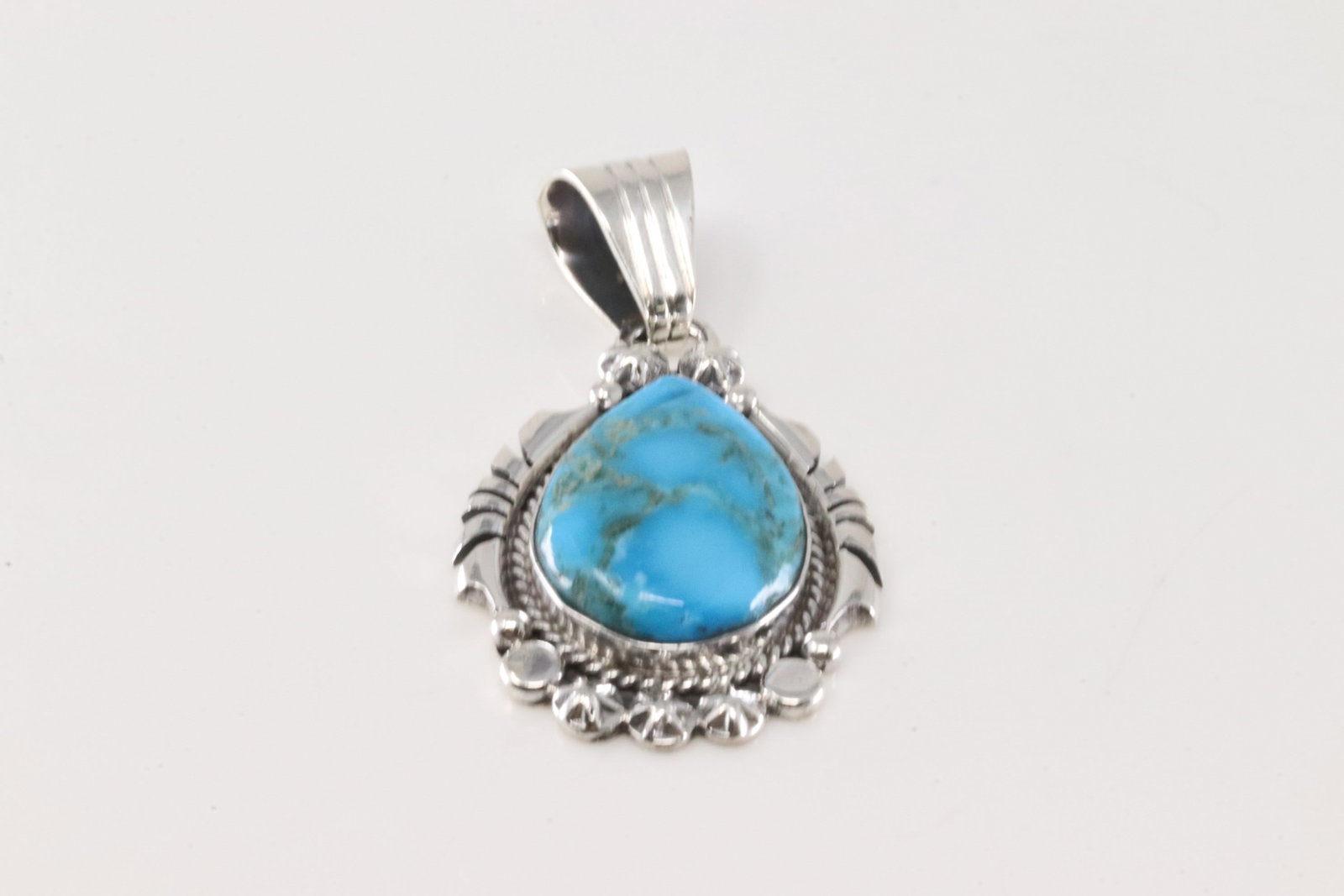Native America Navajo Sterling Silver Turquoise Pendant By Samuel Yellowhair.: This is a Native America Navajo Sterling Silver Turquoise Pendant By Samuel Yellowhair.