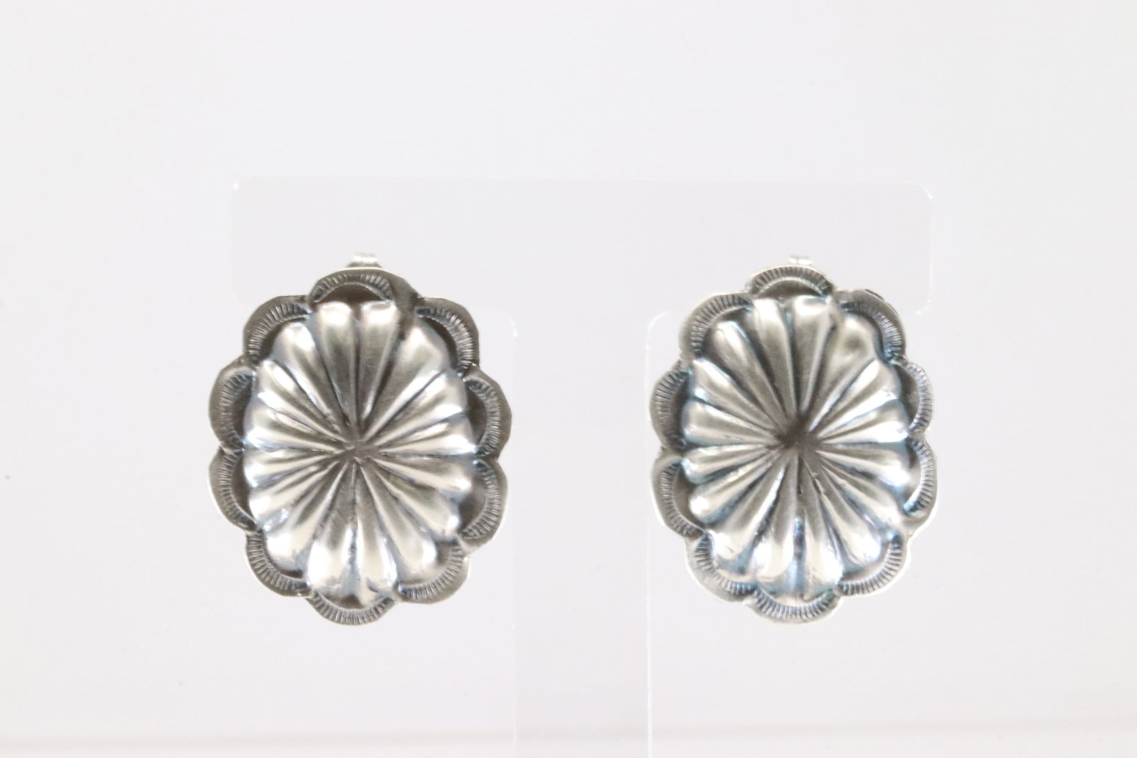 Native America Navajo Sterling Silver Conch Post Earring's By Joan & Ryan Begay.: This is a Native America Navajo Sterling Silver Conch Post Earring's By Joan & Ryan Begay.