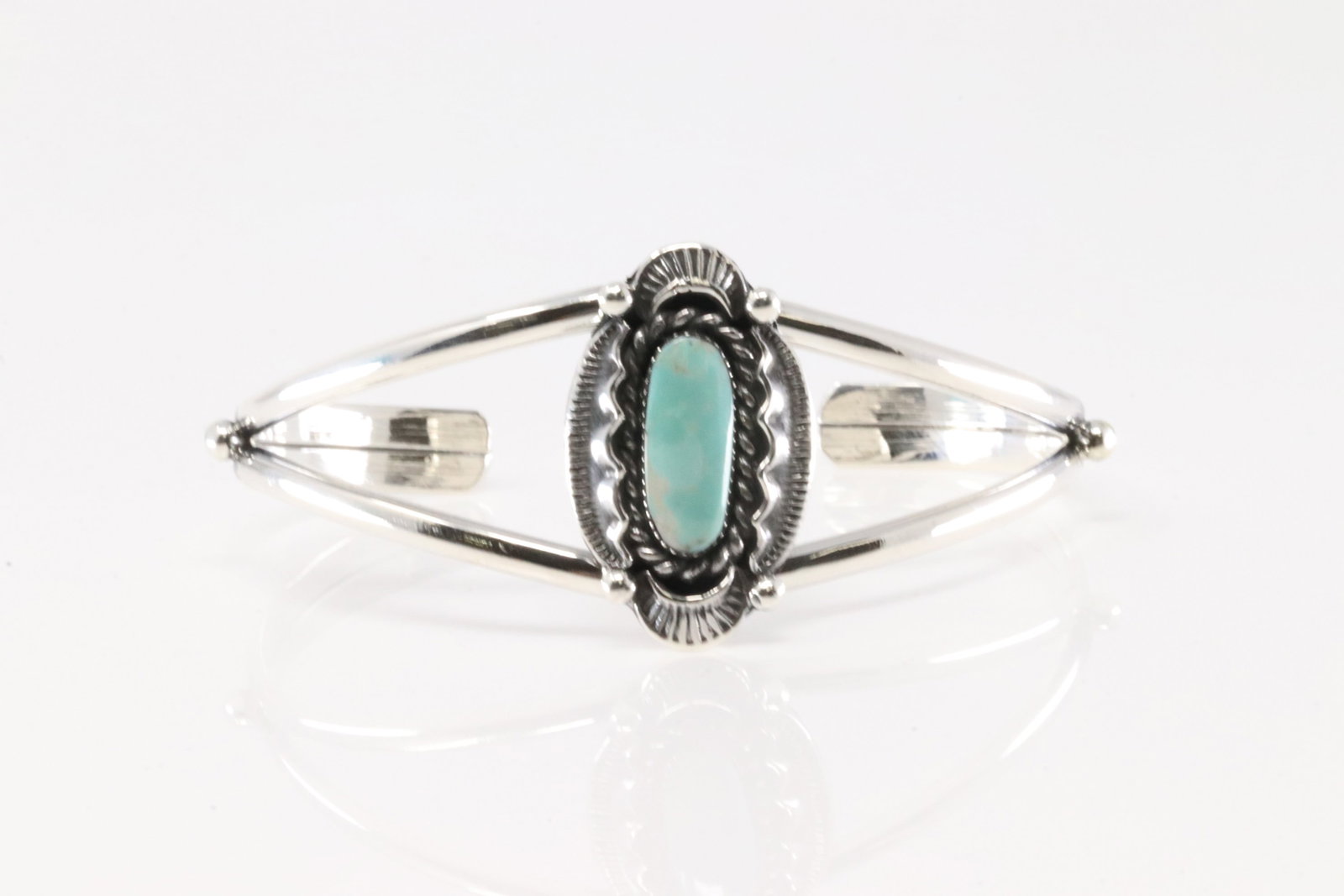 Native America Navajo Sterling Silver Turquoise Bracelet Cuff By Sadie Jim.: This is a Native America Navajo Sterling Silver Turquoise Bracelet Cuff By Sadie Jim.