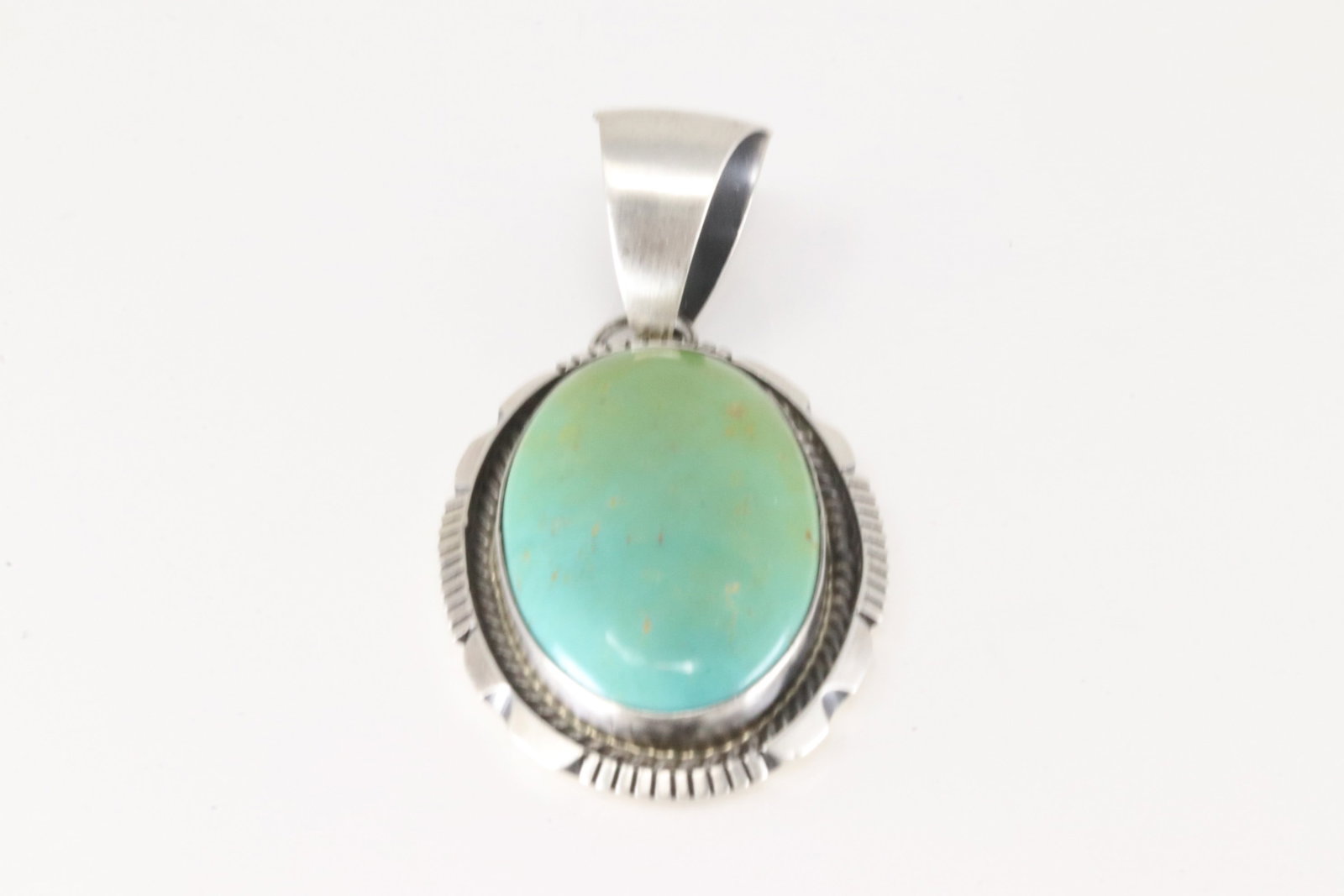 Native America Navajo Sterling Silver Kingman Turquoise Pendant By Alfred Martinez.: This is a Native America Navajo Sterling Silver Kingman Turquoise Pendant By Alfred Martinez.
