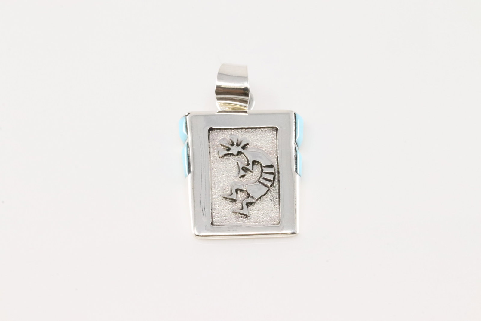 Native America Navajo Sterling Silver Turquoise Kokopelli Pendant By Leonard Jim.: This is a Native America Navajo Sterling Silver Turquoise Kokopelli Pendant By Leonard Jim.