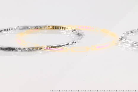 Ruby & Diamond Bracelet 14Kt.: 14Kt Yellow Gold Ruby & Diamond Bracelet. This beautiful bracelet has 42 rubies with 18 round diamonds. Bracelet length: 8.00" Total weight: 7.80 Grams.
